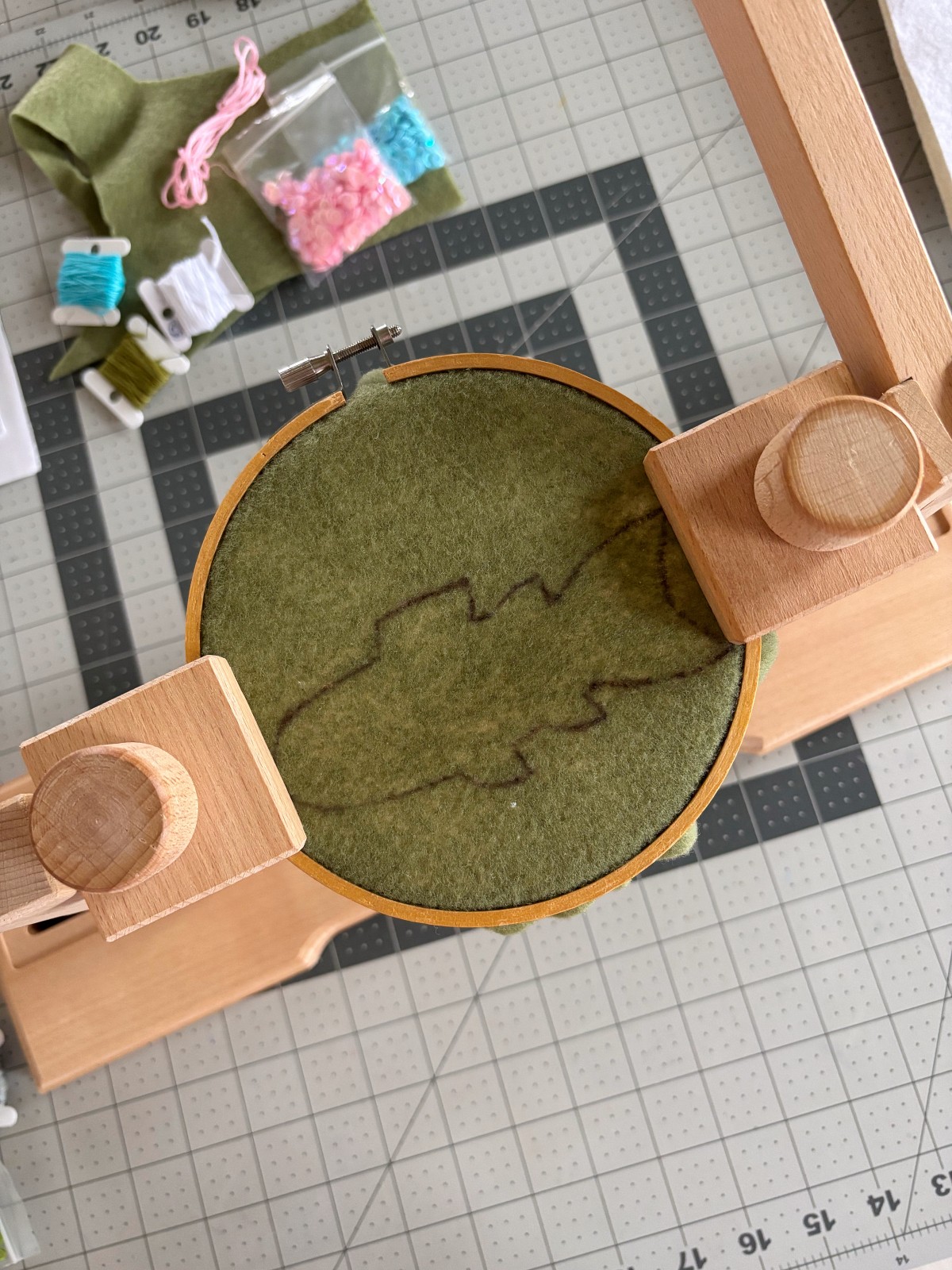 Trout body piece in embroidery hoop.