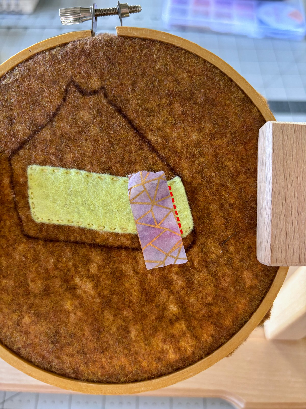 Detail stitch placement for filling layer shown on brown base.