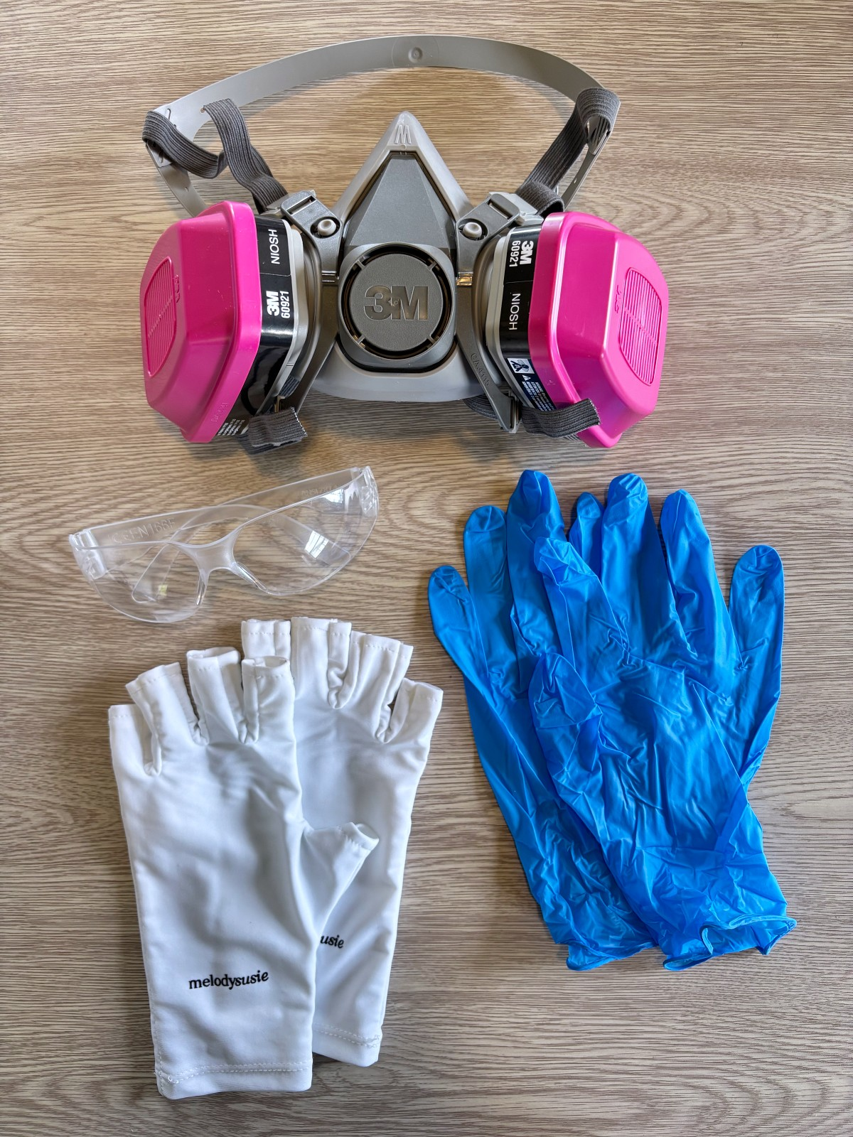Safety equipment I use to UV resin: Respirator, safety glasses, latex gloves, and UV blocking gloves.