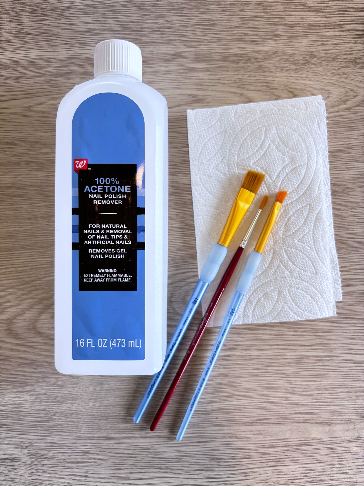 100% Acetone and paintbrushes I use to clean up UV resin.