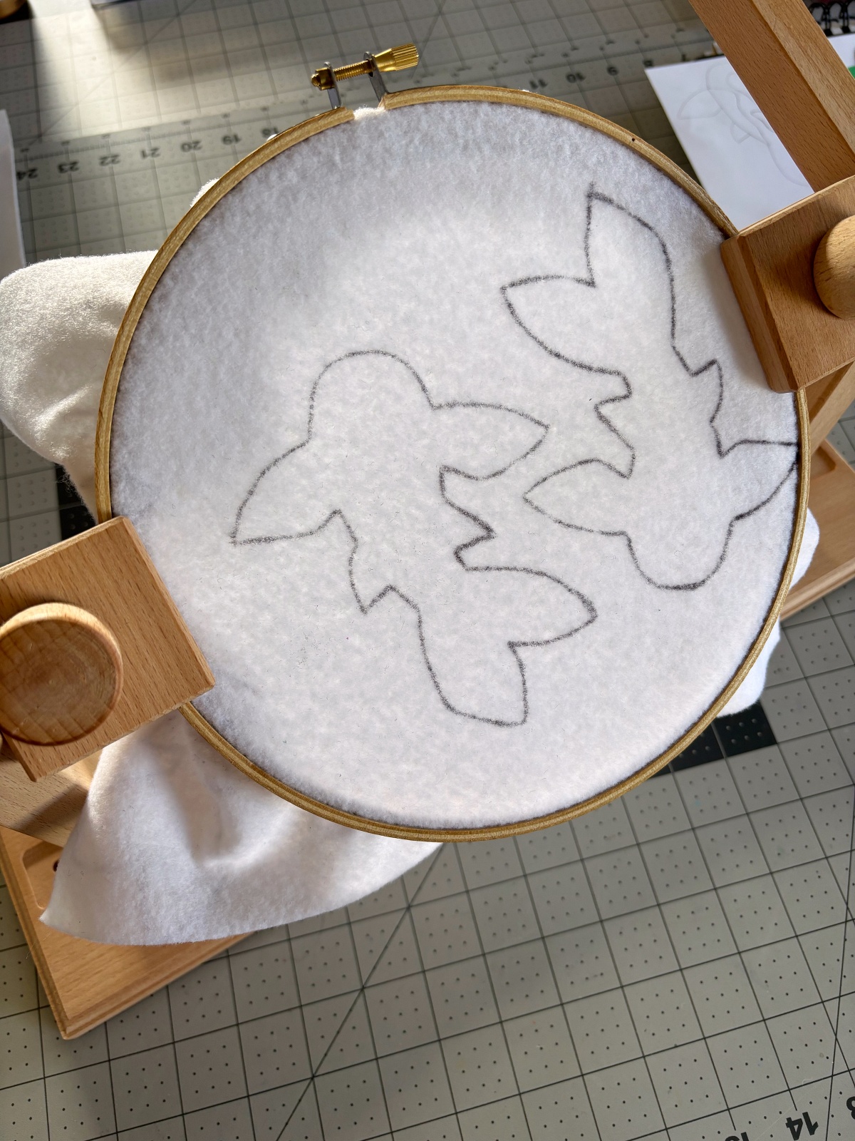 Koi fish base piece in an embroidery hoop.