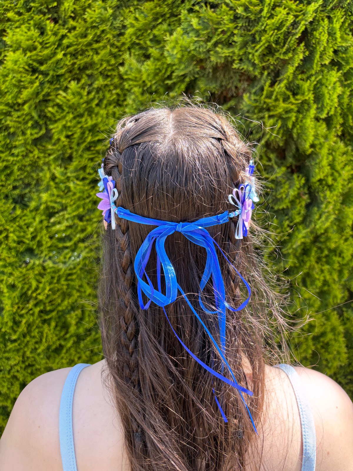 Back view of the finished flower crown on a head.
