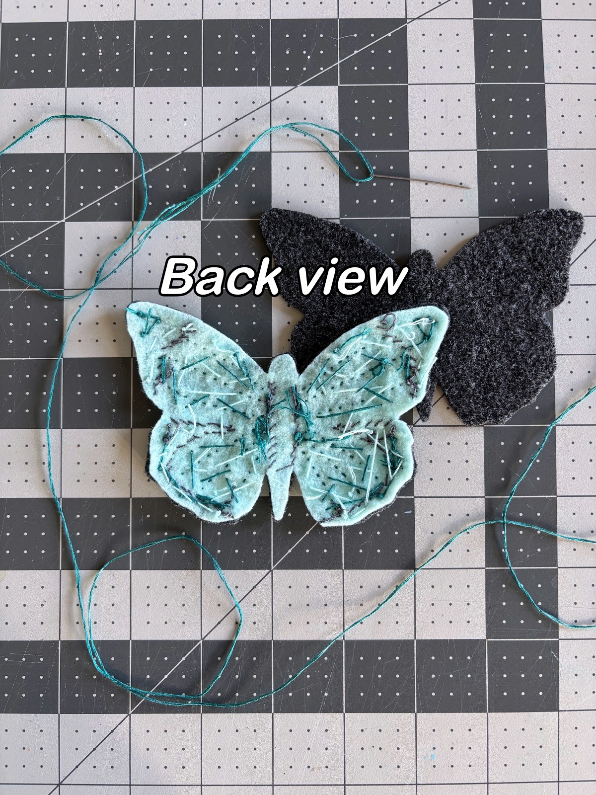 Back view of the butterfly ornament before sewing it to the base piece.