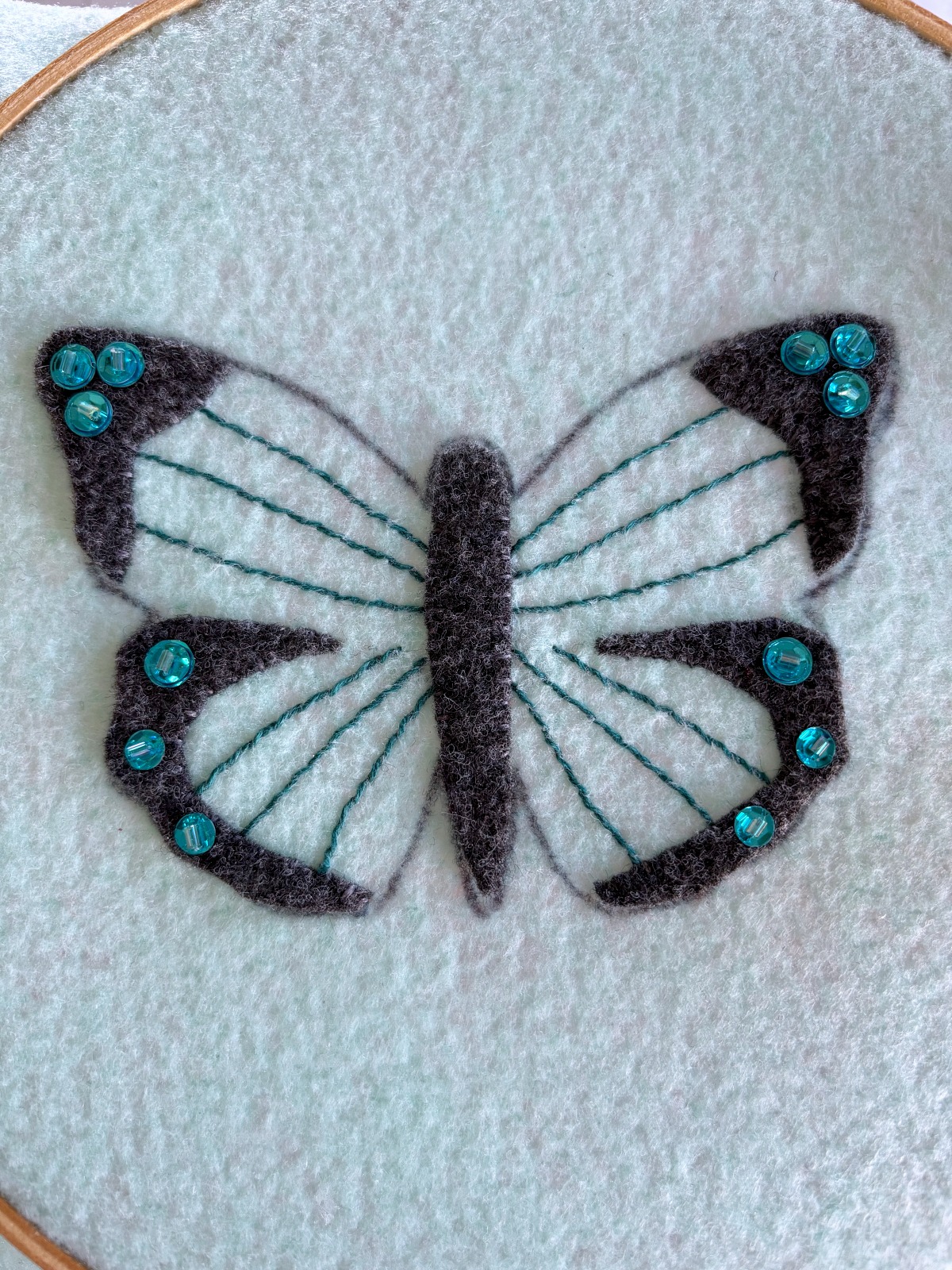 Finished sequins on the butterfly wings.